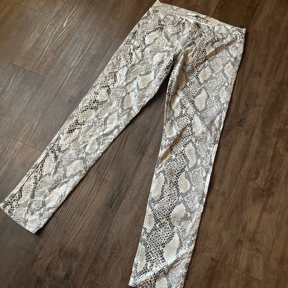 Snake print textured slim fit pants / jeans.